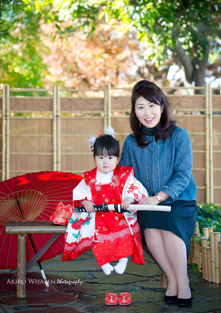 boy and girl in kimonos in Japanese Room, celebrating Shichi Go San,