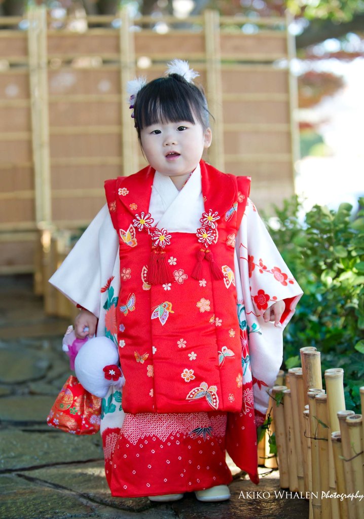 boy and girl in kimonos in Japanese Room, celebrating Shichi Go San,