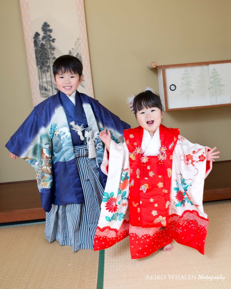 boy and girl in kimonos in Japanese Room, celebrating Shichi Go San,