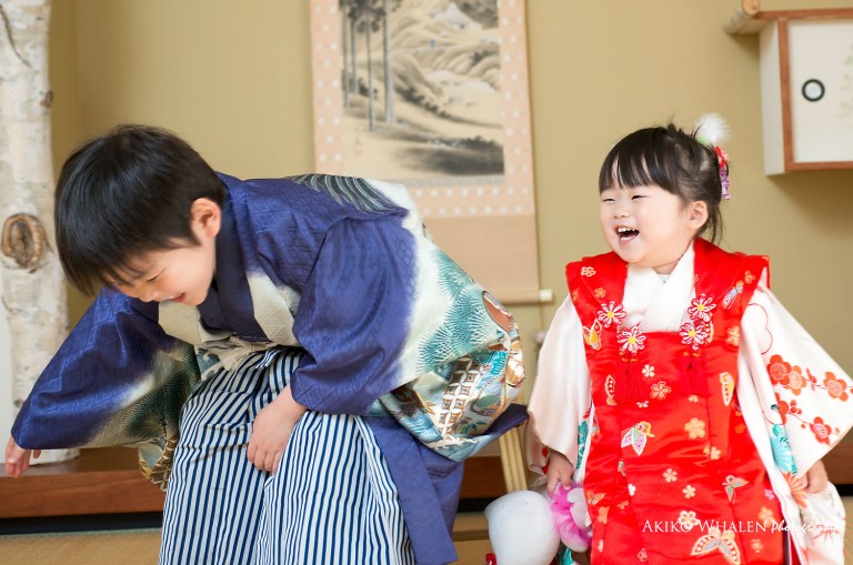 boy and girl in kimonos in Japanese Room, celebrating Shichi Go San,