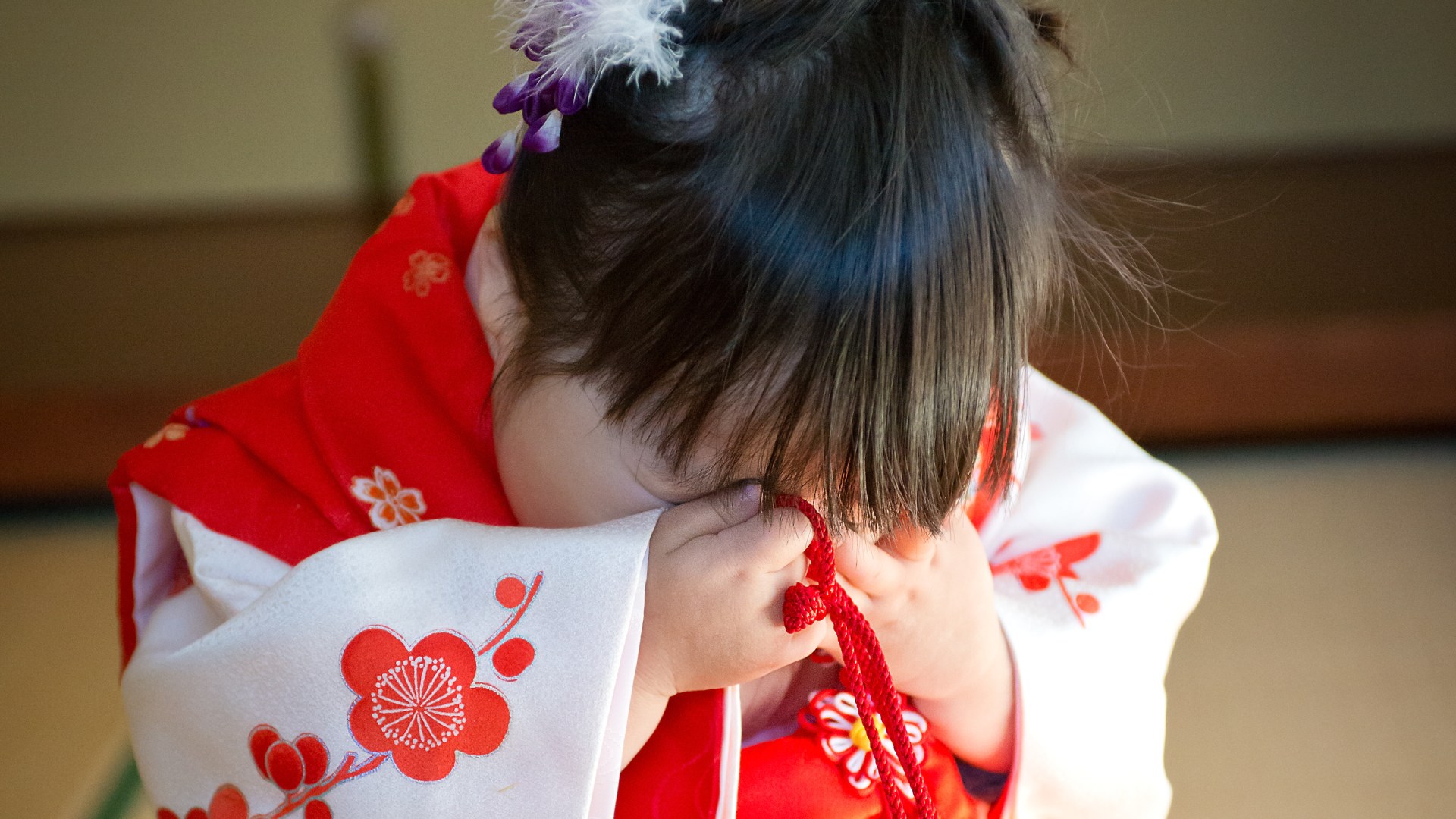 boy and girl in kimonos in Japanese Room, celebrating Shichi Go San,